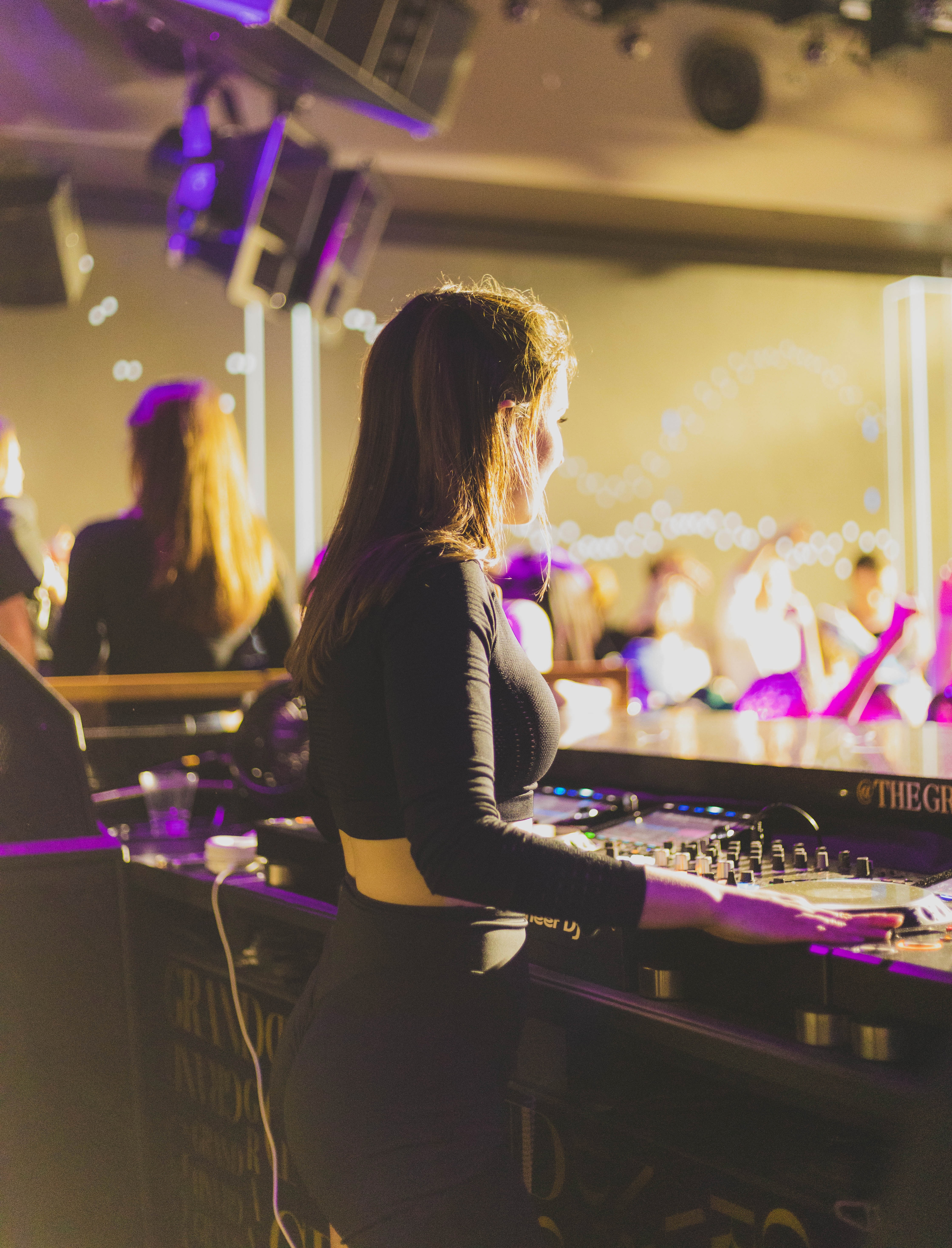 Maisy at the decks during a set